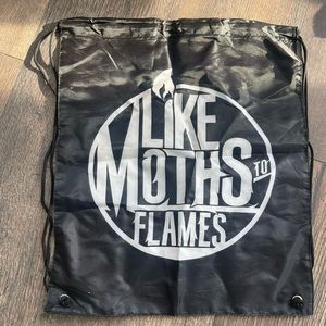 Like Moths to Flames string bag. **never used!!